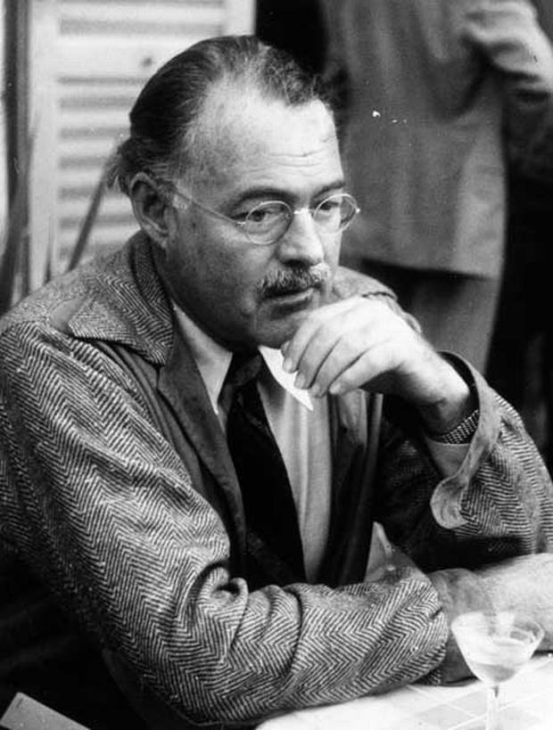 Hemingway with glasses in mid-life